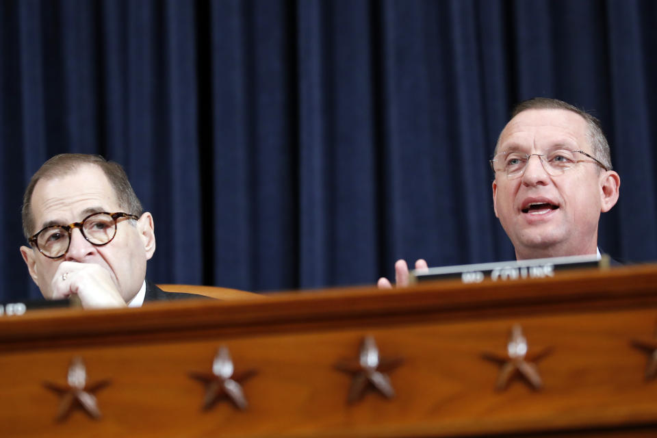 House Judiciary Committee Chairman Rep. Jerrold Nadler, D-N.Y., left, listens as ranking member Rep. Doug Collins, R-Ga., gives an opening statement as the House Judiciary Committee hears investigative findings in the impeachment inquiry of President Donald Trump, Monday, Dec. 9, 2019, on Capitol Hill in Washington. (AP Photo/Alex Brandon)