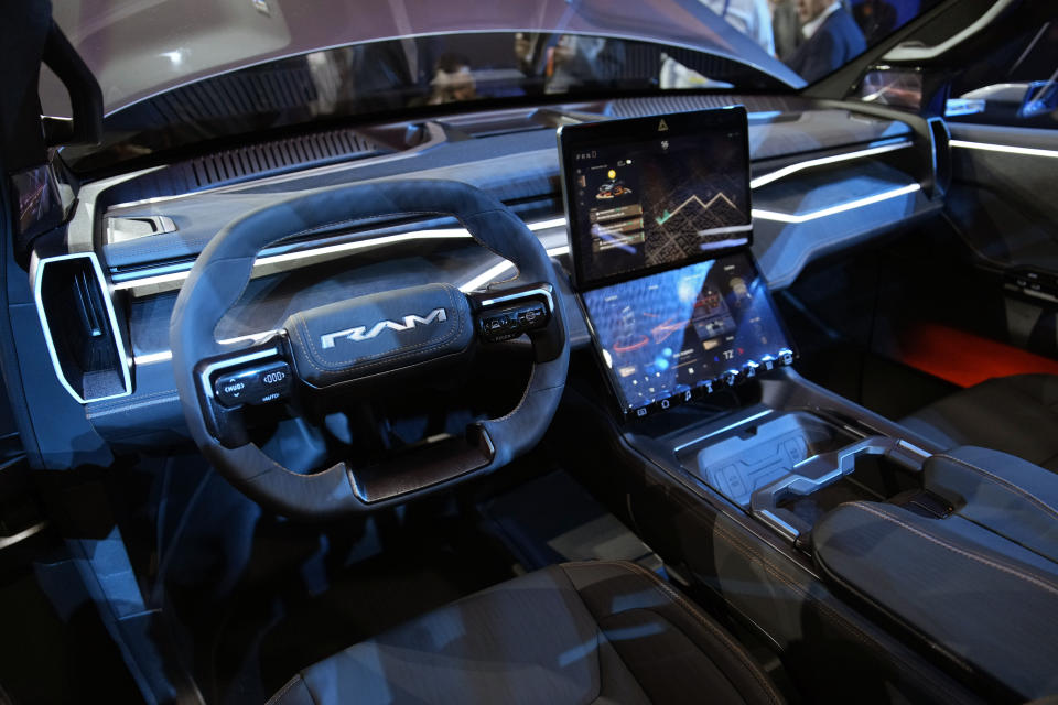 The interior of the Ram 1500 Revolution electric battery powered pickup truck is seen after the Stellantis keynote at the CES tech show Thursday, Jan. 5, 2023, in Las Vegas. (AP Photo/John Locher)