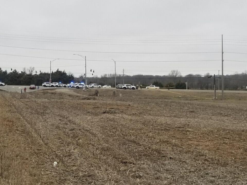 In this image provided by WHNT News 19, police respond to a Black Hawk helicopter crash Wednesday, Feb. 15, 2023, in Alabama. U.S. military officials say two people on board the helicopter, which was from the Tennessee National Guard, were killed. (Chris Frierson/WHNT News 19/Nexstar Media Group via AP)