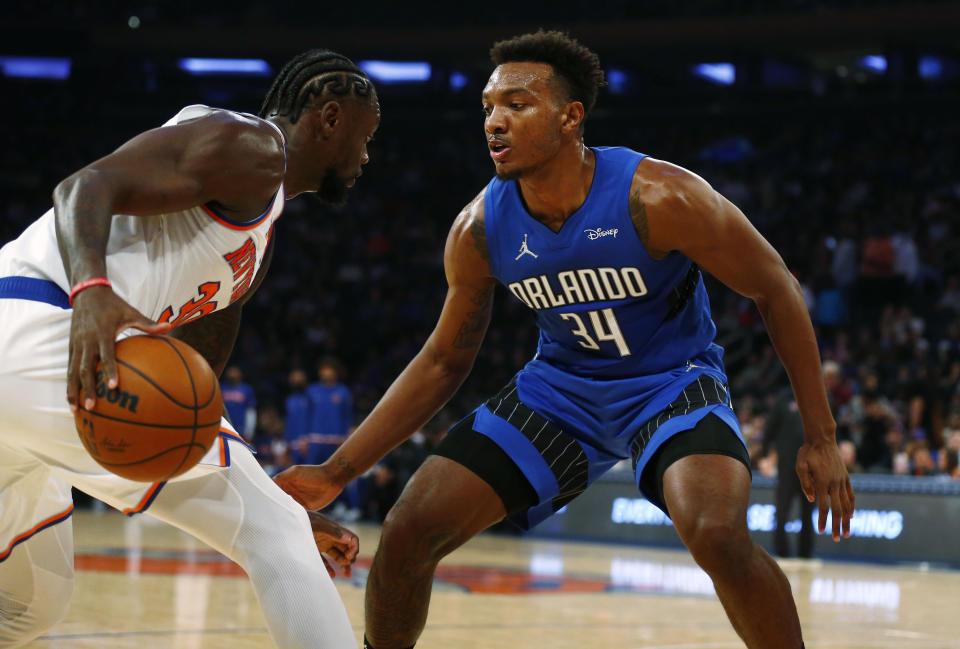 Orlando Magic's Wendell Carter Jr. (34) guards the Knicks' Julius Randle (30) during an NBA basketball game, Sunday, Oct. 24, 2021, in New York. (AP Photo/John Munson)