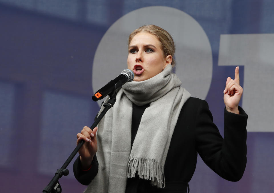 Russian opposition activist Lyubov Sobol speaks during a rally to support political prisoners in Moscow, Russia, Sunday, Sept. 29, 2019. Thousands of people are rallying in Moscow to demand the release of those who were arrested during a wave of opposition demonstrations this summer. (AP Photo/Dmitri Lovetsky)