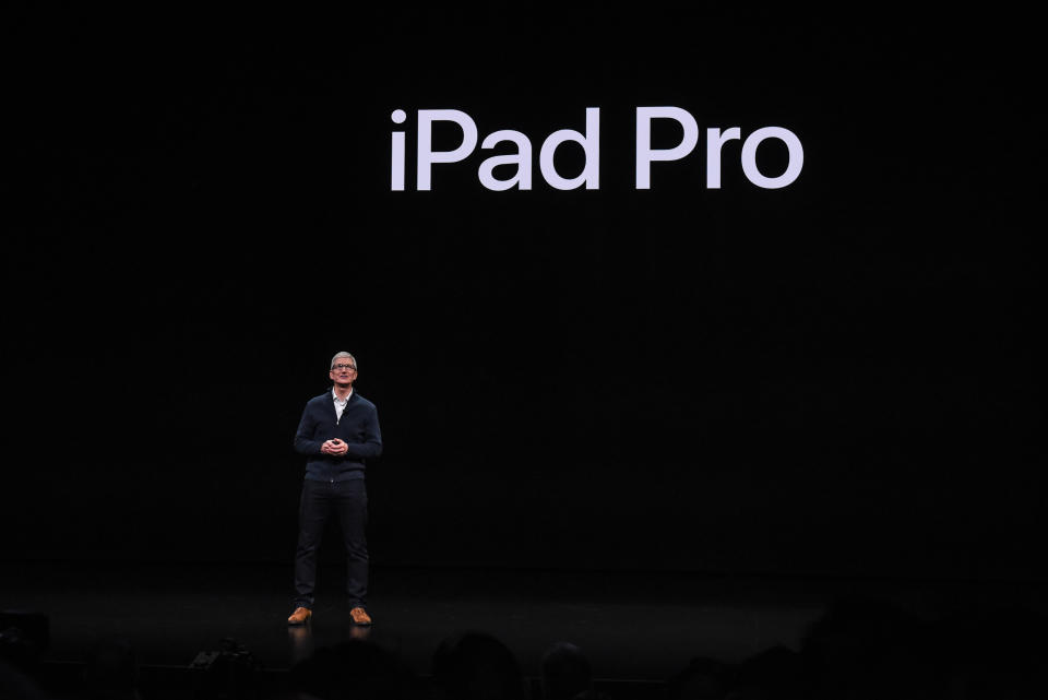 NEW YORK, NY - OCTOBER 30: Tim Cook, CEO of Apple unveils a new iPad Pro during a launch event at the Brooklyn Academy of Music on October 30, 2018 in New York City. Apple also debuted a new MacBook Air and Mac Mini. (Photo by Stephanie Keith/Getty Images)