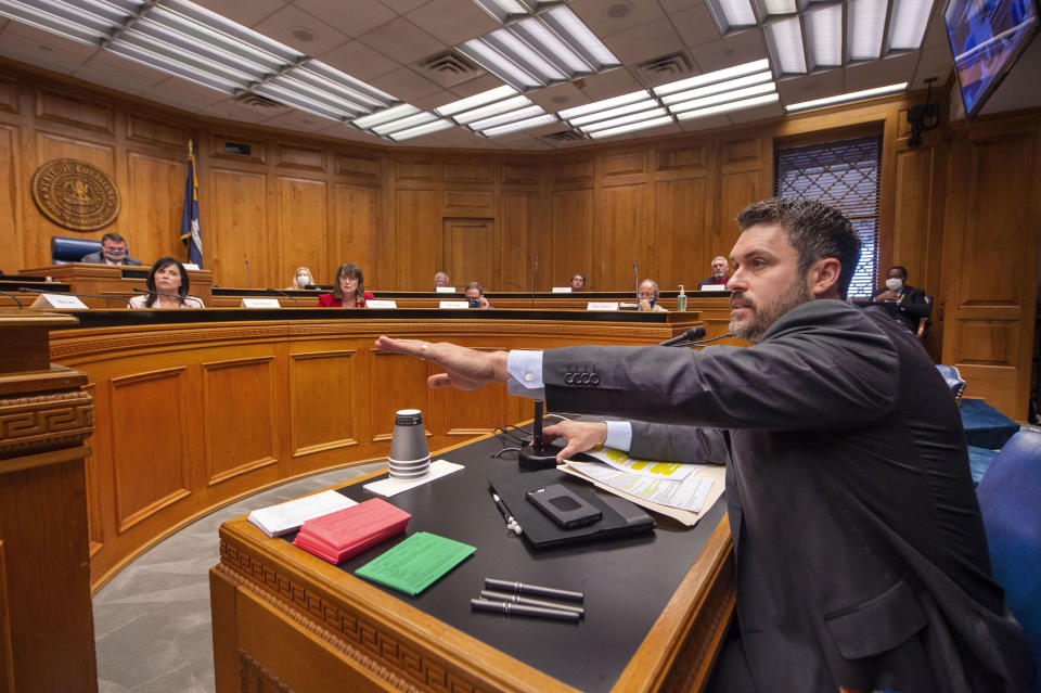 Louisiana House of Representatives Republican Delegation chairman Blake Miguez, R-Erath, speaks in the House and Governmental Affairs committee explaining his House Concurrent Resolution 58, Wednesday, May 6, 2020, at the state Capitol in Baton Rouge, La. Republican lawmakers trying to unravel Louisiana Gov. John Bel Edwards' statewide stay-at-home order began moving legislation Wednesday that would keep the Democratic governor from enforcing the restrictions enacted to combat the coronavirus. (Travis Spradling/The Advocate via AP)