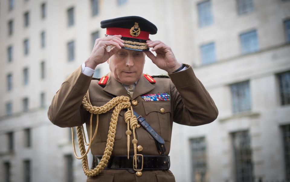 Sir Nick outside the MOD headquarters in Westminster - PA