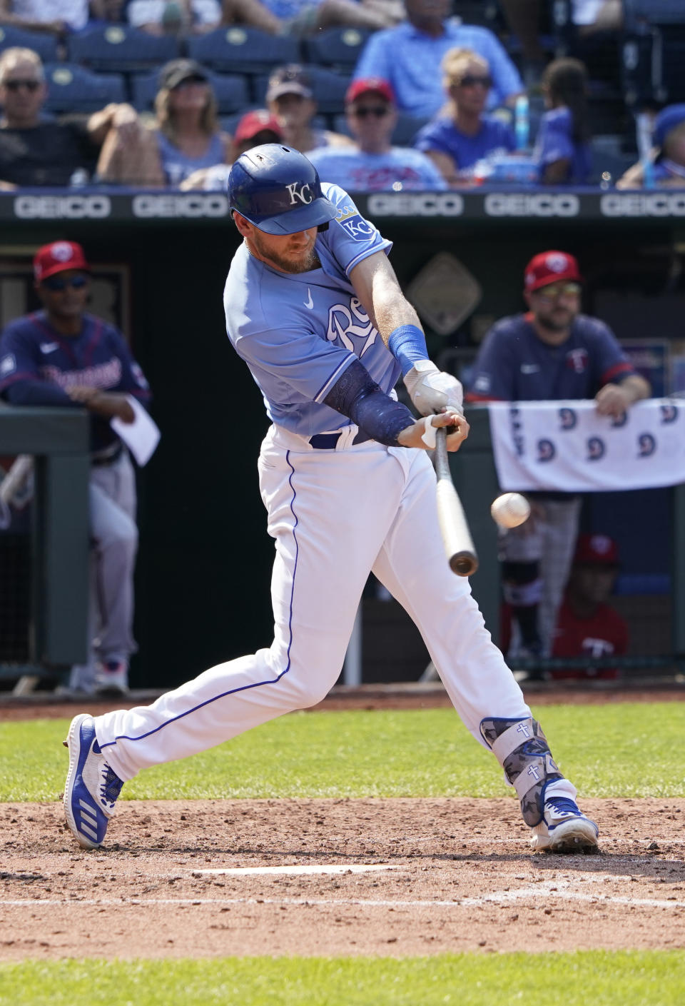 Kansas City Royals' Hunter Dozier hits a two-run double in the fourth inning during a baseball game against the Minnesota Twins, Saturday July 3, 2021, in Kansas City, Mo. (AP Photo/Ed Zurga)