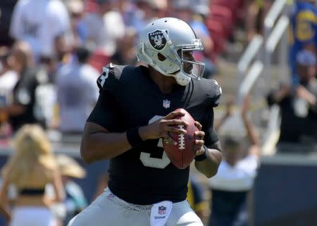 Aug 18, 2018; Los Angeles, CA, USA; Oakland Raiders quarterback EJ Manuel aka E.J. Manuel (3) throws a pass gains the Los Angeles Rams during a preseason game at Los Angeles Memorial Coliseum. Mandatory Credit: Kirby Lee-USA TODAY Sports