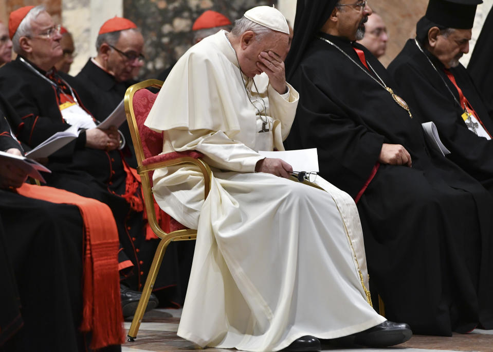 FILE - Pope Francis attends a penitential liturgy at the Vatican, Saturday, Feb. 23, 2019. Five years ago this week, Francis convened an unprecedented summit of bishops from around the world to impress on them that clergy abuse was a global problem and they needed to address it, but now, five years later, despite new church laws to hold bishops accountable and promises to do better, the Catholic Church's in-house legal system and pastoral response to victims has proven again to be incapable of dealing with the problem. (Vincenzo Pinto/Pool Photo Via AP, file)