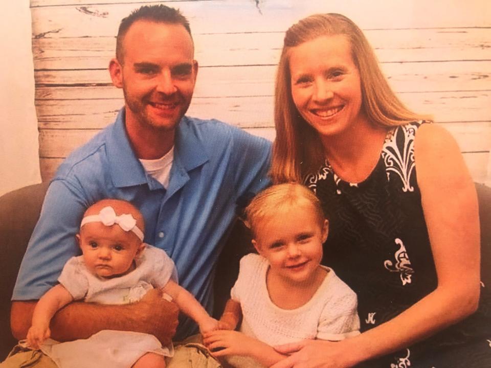 Dan and Michelle Overmiller with their daughters, Emily, 2 (left), and Addison, 5. Michelle is Chris' oldest daughter and walks with her mother through the journey of grief they've faced.