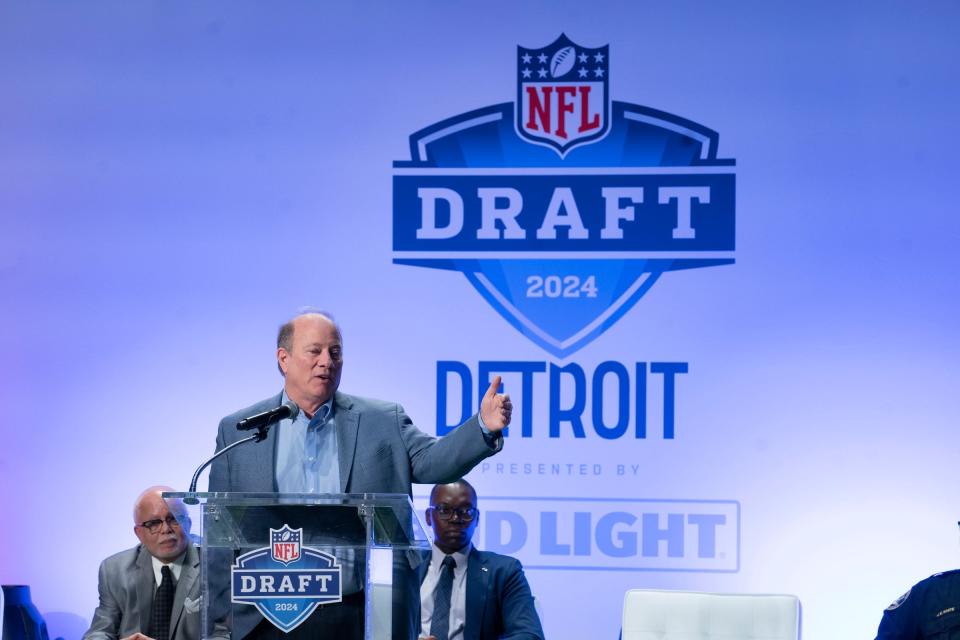 Detroit Mayor Mike Duggan takes the stage as Detroit Sports Commission and Visit Detroit during a press conference at Ford Field on Monday, Nov. 27, 2023.