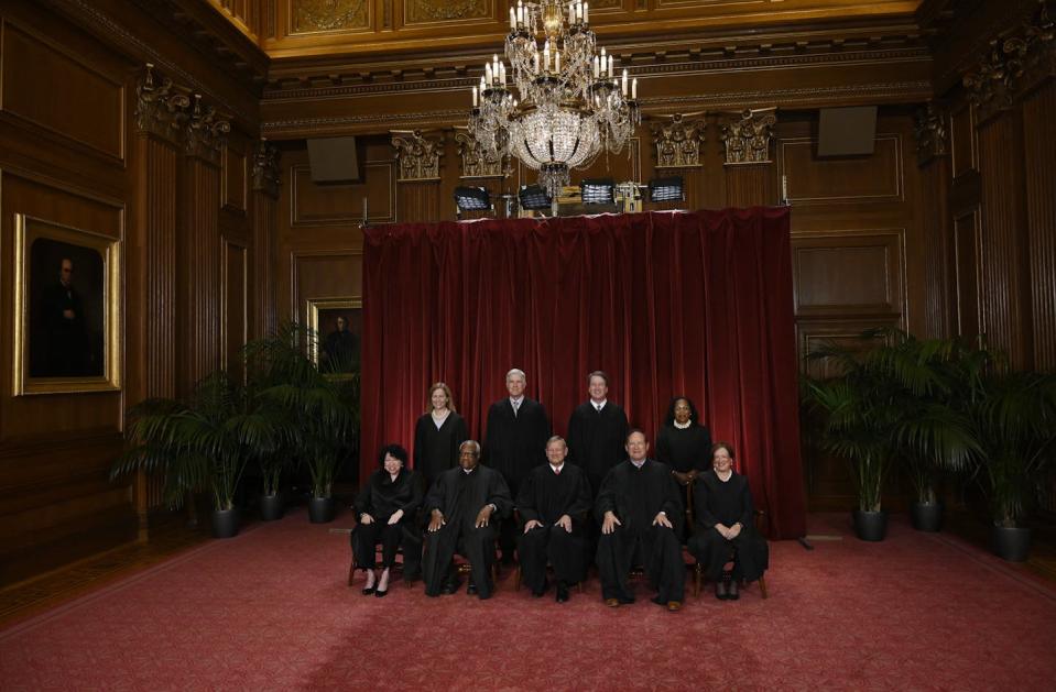 Justices of the Supreme Court pose for their official photo at the Supreme Court building in Washington, Oct. 7, 2022. <a href="https://www.gettyimages.com/detail/news-photo/justices-of-the-us-supreme-court-pose-for-their-official-news-photo/1243795208?adppopup=true" rel="nofollow noopener" target="_blank" data-ylk="slk:Olivier Douliery/AFP via Getty Images;elm:context_link;itc:0;sec:content-canvas" class="link ">Olivier Douliery/AFP via Getty Images</a>