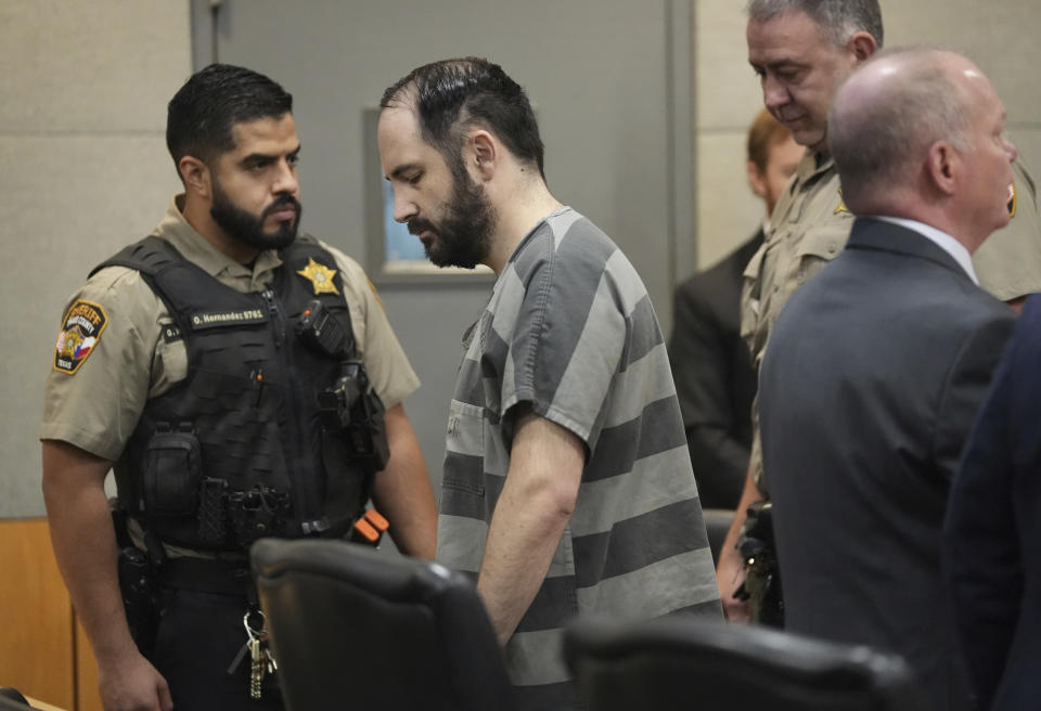 Daniel Perry returns to his chair after being sentenced to 25 years for the murder of Garrett Foster at the Blackwell-Thurman Criminal Justice Center in Austin, Texas, on Wednesday May 10, 2023. Perry was convicted of murder in April for killing Foster during a Black Lives Matter protest in July 2020. (Jay Janner/Austin American-Statesman via AP, Pool)