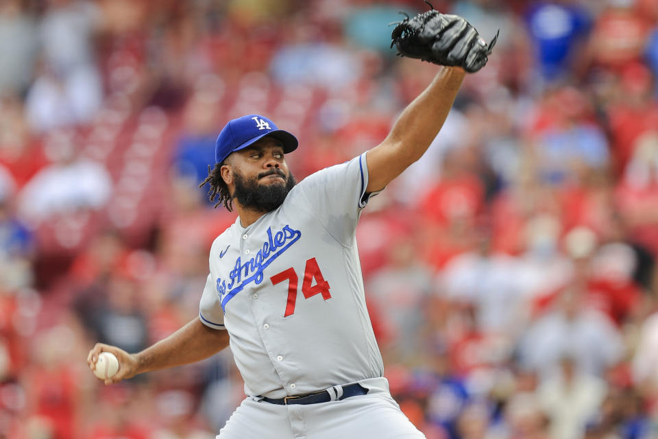 FILE - Los Angeles Dodgers' Kenley Jansen throws during the ninth inning of the team's baseball game against the Cincinnati Reds in Cincinnati on Sept. 18, 2021. The Atlanta Braves signed Jansen to a $16 million, one-year contract Friday night, March 18. The 34-year-old Jansen, who had 38 saves and a 2.22 ERA in 69 appearances for the Dodgers last season, is expected to take over from Will Smith as the Braves' primary closer. (AP Photo/Aaron Doster, File)