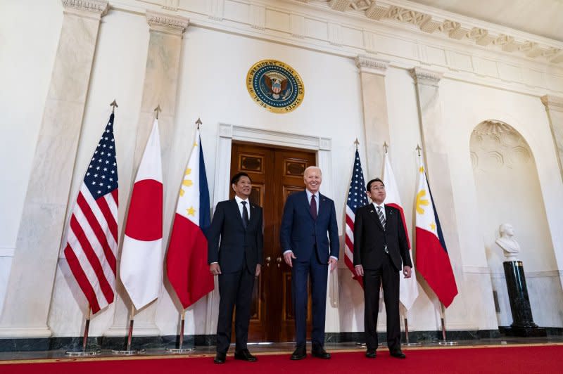 U.S. President Joe Biden (C) with Philippines President Ferdinand Marcos Jr. (L) and Japanese Prime Minister Fumio Kishida (R) at April's trilateral meeting at the White House with the leaders of the Indo-Pacific countries. Biden unveiled joint military patrols and training with the Philippines and Japan as the allies seek to counter an increasingly assertive China in the South China Sea. Photo by Al Drago/UPI