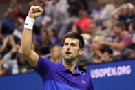 Novak Djokovic, of Serbia, reacts after reaching break point against Jenson Brooksby, of the United States, during the fourth round of the U.S. Open tennis championships, Monday, Sept. 6, 2021, in New York. Djokovic won the match. (AP Photo/John Minchillo)