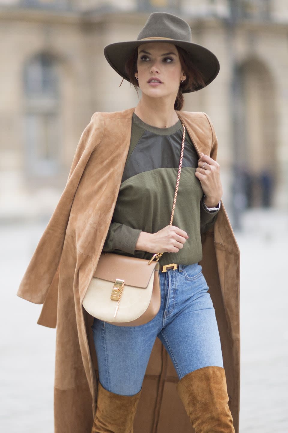 Clothing, Street fashion, Shoulder, Fashion, Beige, Outerwear, Jeans, Snapshot, Khaki, Hat, 