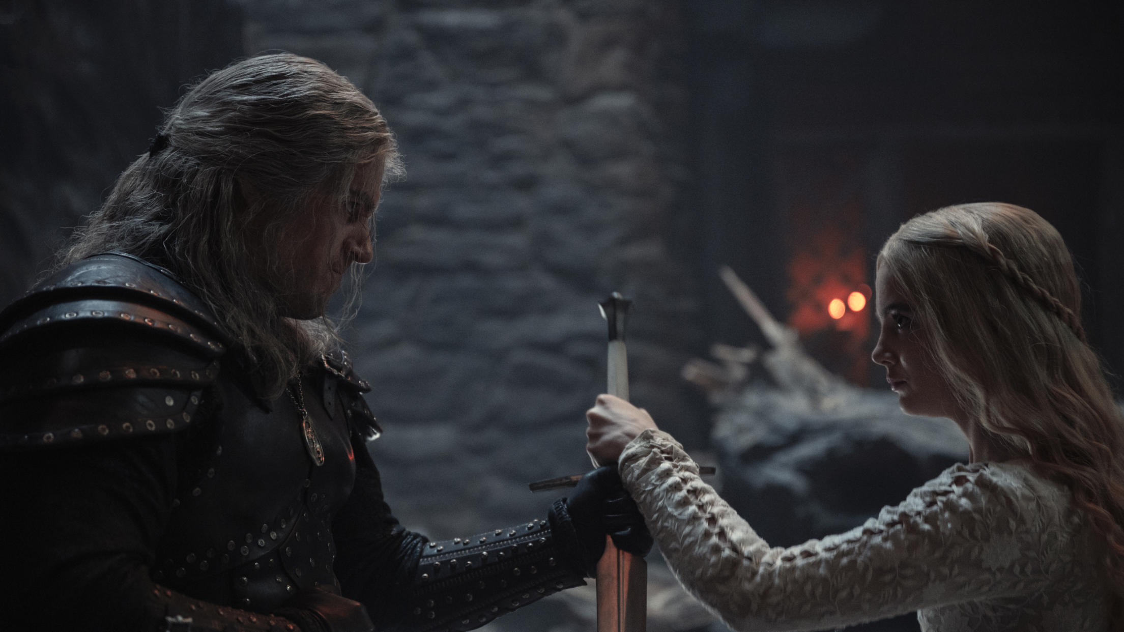 Henry Cavill and Freya Allan in The Witcher season two. (Credit: Netflix/Susie Allnutt)
