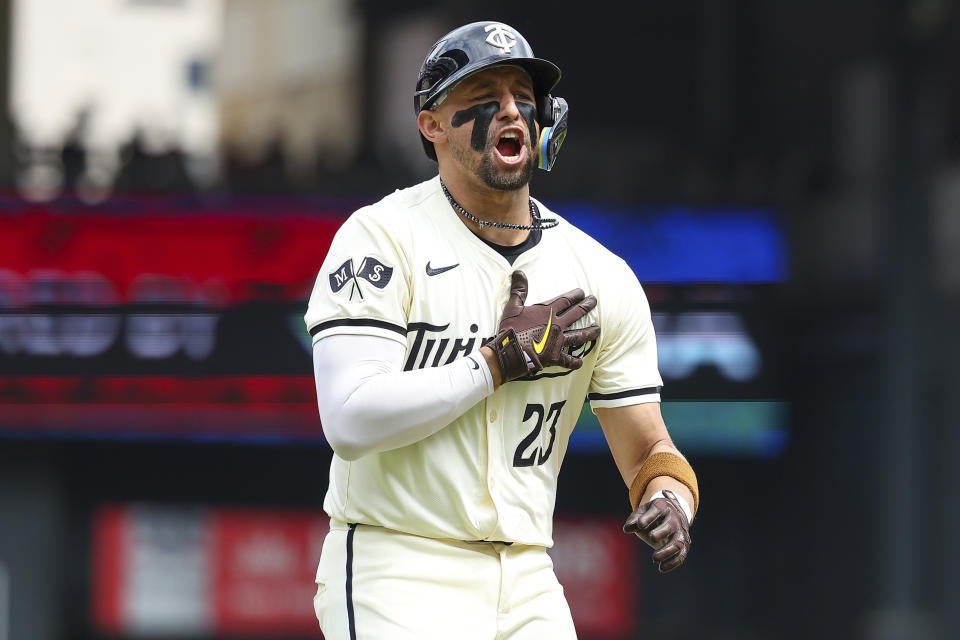 Minnesota Twins' Royce Lewis celebrates after his three-run home run as he runs the bases during the second inning of a baseball game against the Chicago White Sox, Sunday, Aug. 4, 2024, in Minneapolis. (AP Photo/Matt Krohn)