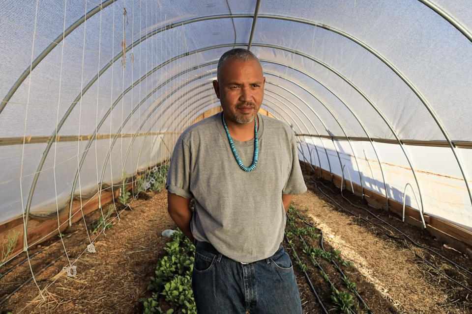 Tyrone Thompson is the owner and operator of Ch'ishie Farms, and a member of the Navajo Nation. He is working with local grocers and chefs to develop a community-based food system that will bring crops like his microgreens and radishes to the tables of his fellow Diné, as many Navajo prefer to be called. He is also teaching his neighbors how to construct sustainable hoophouses to grow crops year round, and has already constructed 40 in his local area. (Chiara Sottile / NBC News)