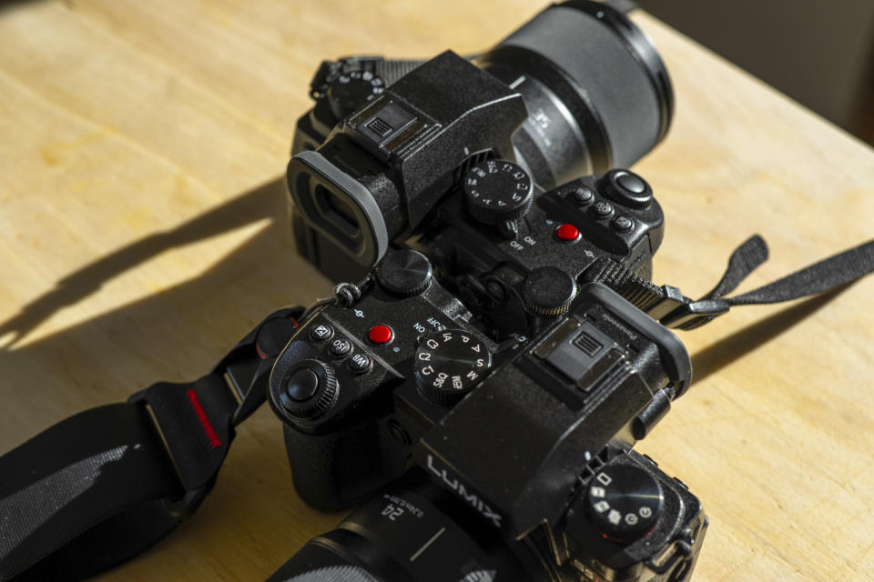 Panasonic S5 IIX and S5 II camera side by side on a table