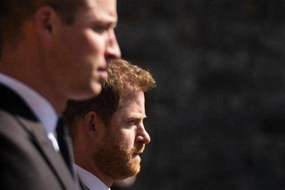 Prince William, the Duke of Cambridge and Prince Harry walk in the procession, ahead of Britain Prince Philip's funeral at Windsor Castle, Windsor, England, Saturday April 17, 2021. Prince Philip died April 9 at the age of 99 after 73 years of marriage to Britain's Queen Elizabeth II. (Victoria Jones/Pool via AP)