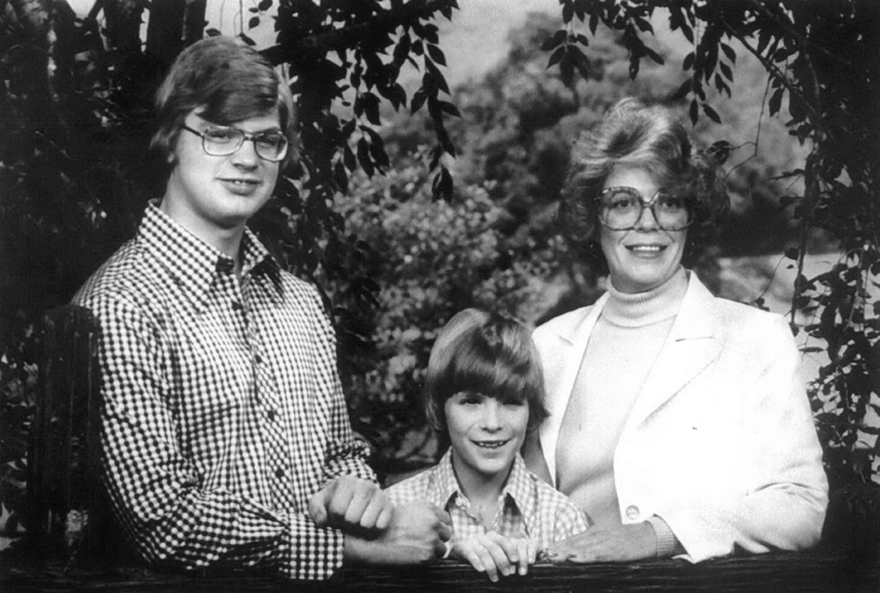 Jeffrey Dahmer (left) poses with his mother, Joyce Flint, and younger brother, David. The undated portrait was provided by Flint.