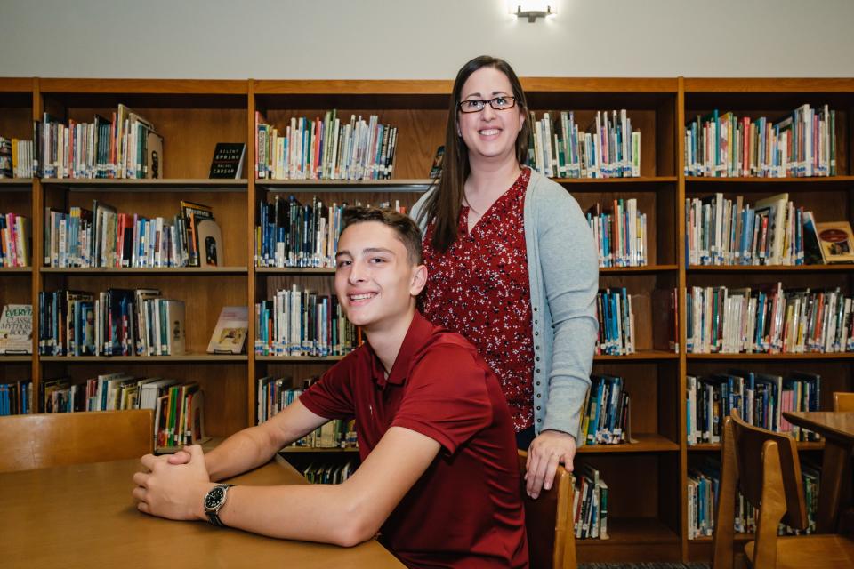 Dover Middle School student Bryce Beckley and his mother Lyndy pose May 9 in the Dover MIddle School library. Bryce will compete in the Scripps National Spelling Bee in Maryland. Competition will begin with the preliminaries on May 30 and conclude with the finals on June 1.