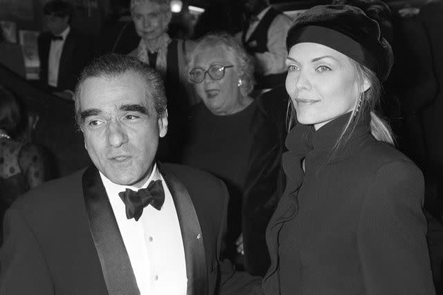 <p>Fairchild Archive/Penske Media via Getty</p> Michelle Pfeiffer and Martin Scorsese in 1993