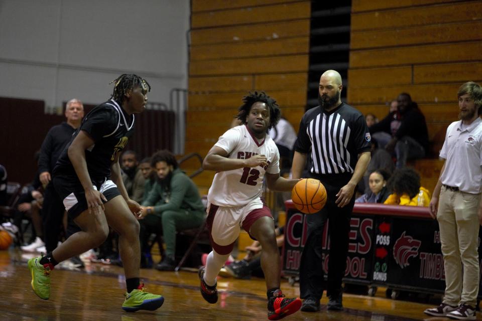 Lincoln boy's basketball defeated Chiles 61-47 on Tuesday, Jan. 16, 2023 in Trojans head coach Andy Colville's 500th win