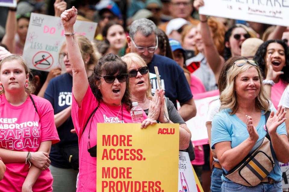 Abortion rights activists rally during a Bans Off Our Bodies protest at University of Michigan's Diag in Ann Arbor on Saturday, May 14, 2022.