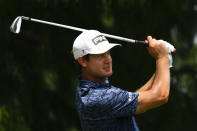 Harris English hits on the 12th hole during the first round in the World Golf Championship-FedEx St. Jude Invitational tournament, Thursday, Aug. 5, 2021, in Memphis, Tenn. (AP Photo/John Amis)