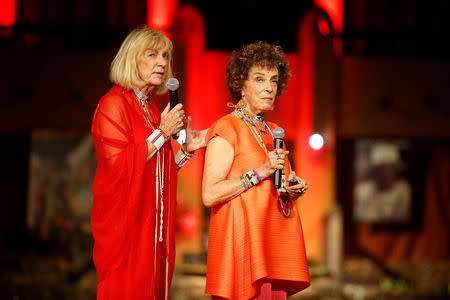 Carol Beckwith and Angela Fisher address an audience during a gala marking the launch of their book called "African Twilight: The Vanishing Rituals and Ceremonies of the African Continent" at the African Heritage House in Nairobi, Kenya March 3, 2019. REUTERS/Baz Ratner