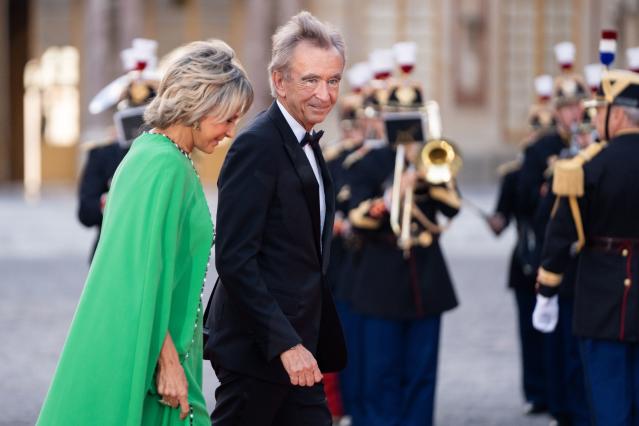 Owner of LVMH Luxury Group Bernard Arnault and his wife Helene