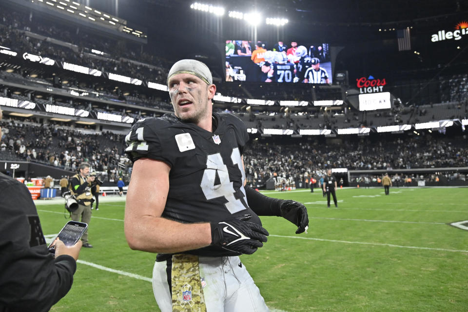 Las Vegas Raiders linebacker Robert Spillane heads off the field following an NFL football game against the New York Jets Sunday, Nov. 12, 2023, in Las Vegas. The Raiders won 16-12. (AP Photo/David Becker)