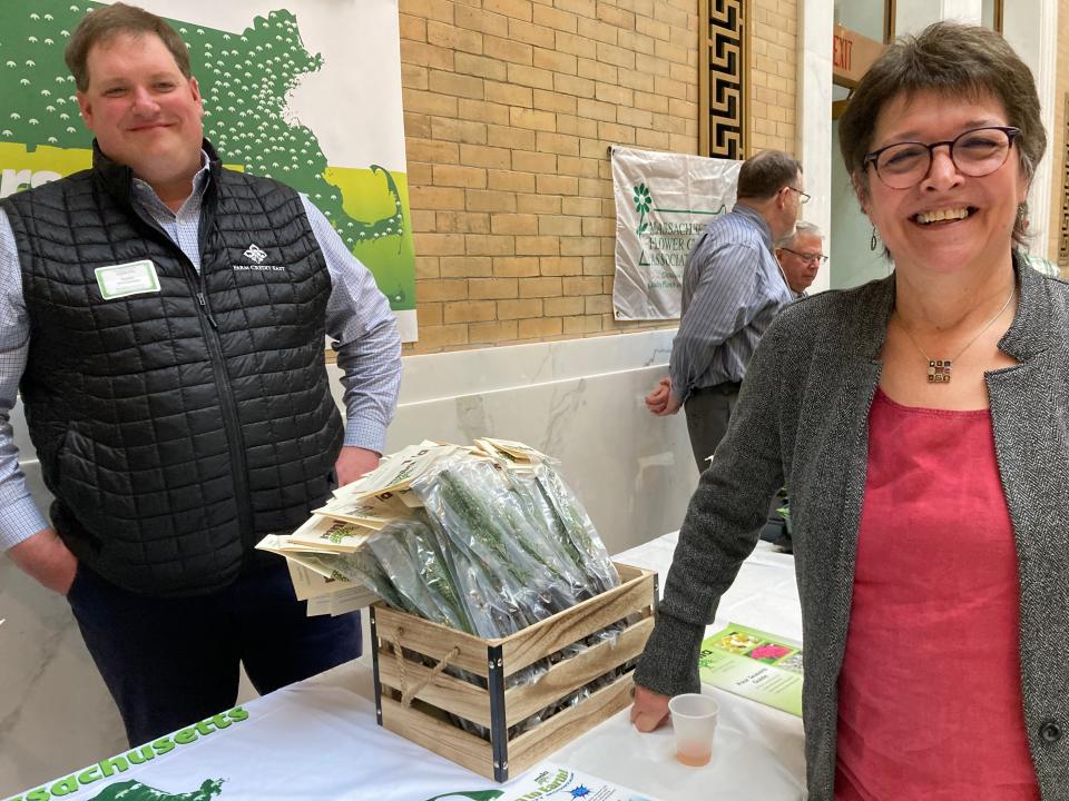 Justin Mortensen of the Massachusetts Nursery & Landscape Association greets Rep. Mindy Domb, D-Amherst, during Ag-Day.