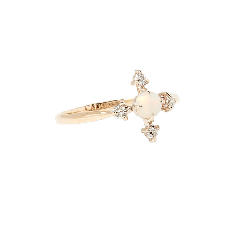 <a rel="nofollow noopener" href="http://rstyle.me/~9Xqxw" target="_blank" data-ylk="slk:Moon Flower 14-Karat Gold, Diamond and Opal Ring, Catbird, $595;elm:context_link;itc:0;sec:content-canvas" class="link ">Moon Flower 14-Karat Gold, Diamond and Opal Ring, Catbird, $595</a>