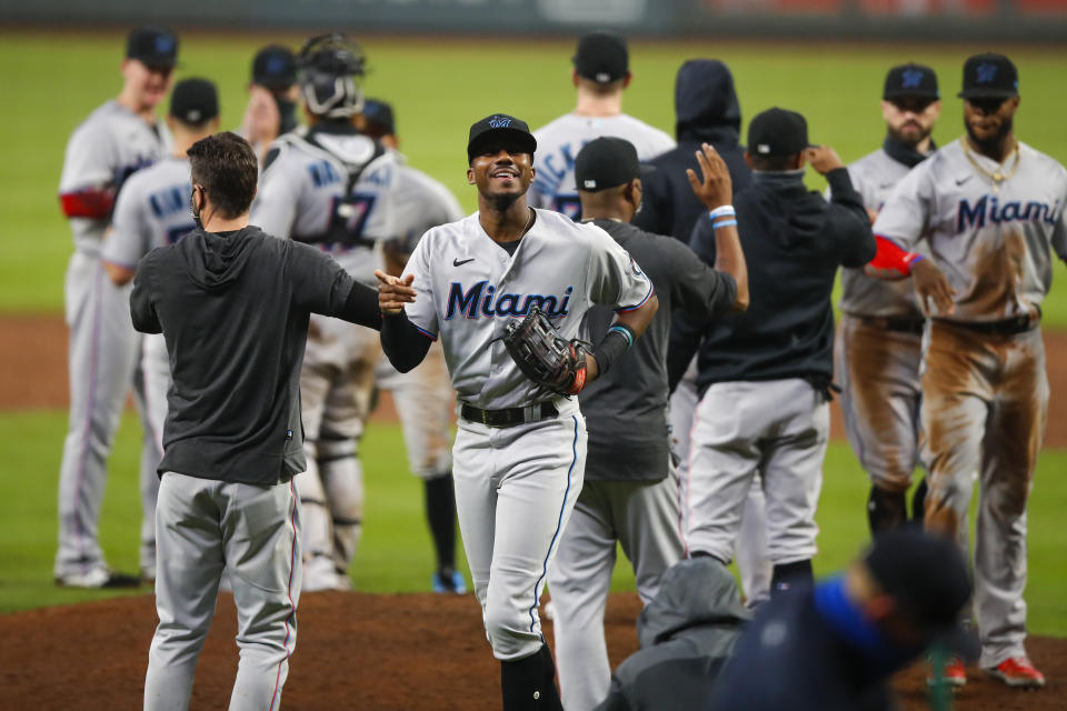 ATLANTA, GA - SEPTEMBER 24: Lewis Brinson #25 of the Miami Marlins reacts at the conclusion of an MLB game against the Atlanta Braves at Truist Park on September 24, 2020 in Atlanta, Georgia. (Photo by Todd Kirkland/Getty Images)