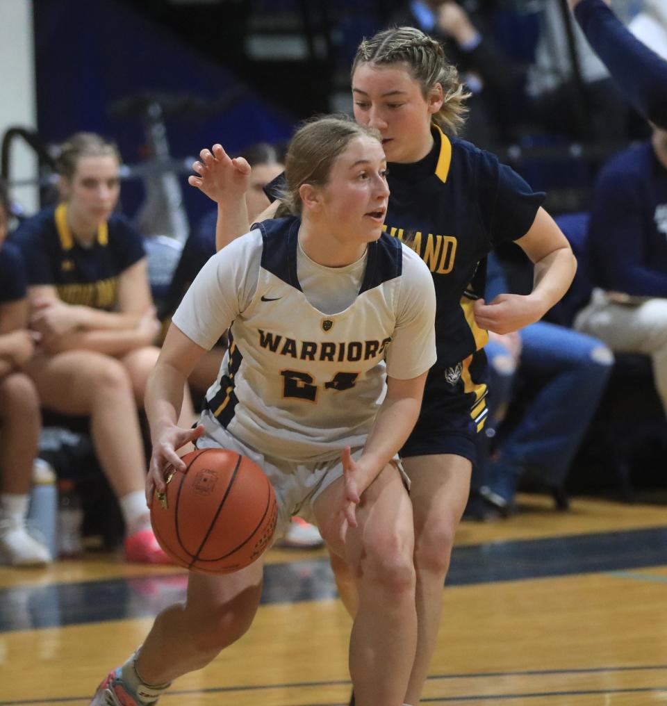 Lourdes' Jackie Kozakiewicz drives against Highland's Logan VanZandt during the MHAL girls basketball final at Dutchess Community College on February 21, 2024.