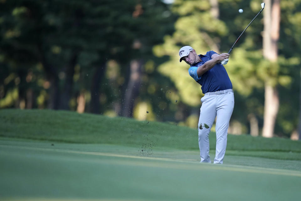 Matt Wallace of England hits a shot on the 18nd hole during the third round of the Zozo Championship golf tournament at Accordia Golf Narashino Country Club on Saturday, Oct. 23, 2021 in Inzai, Chiba prefecture, Japan. (AP Photo/Tomohiro Ohsumi)