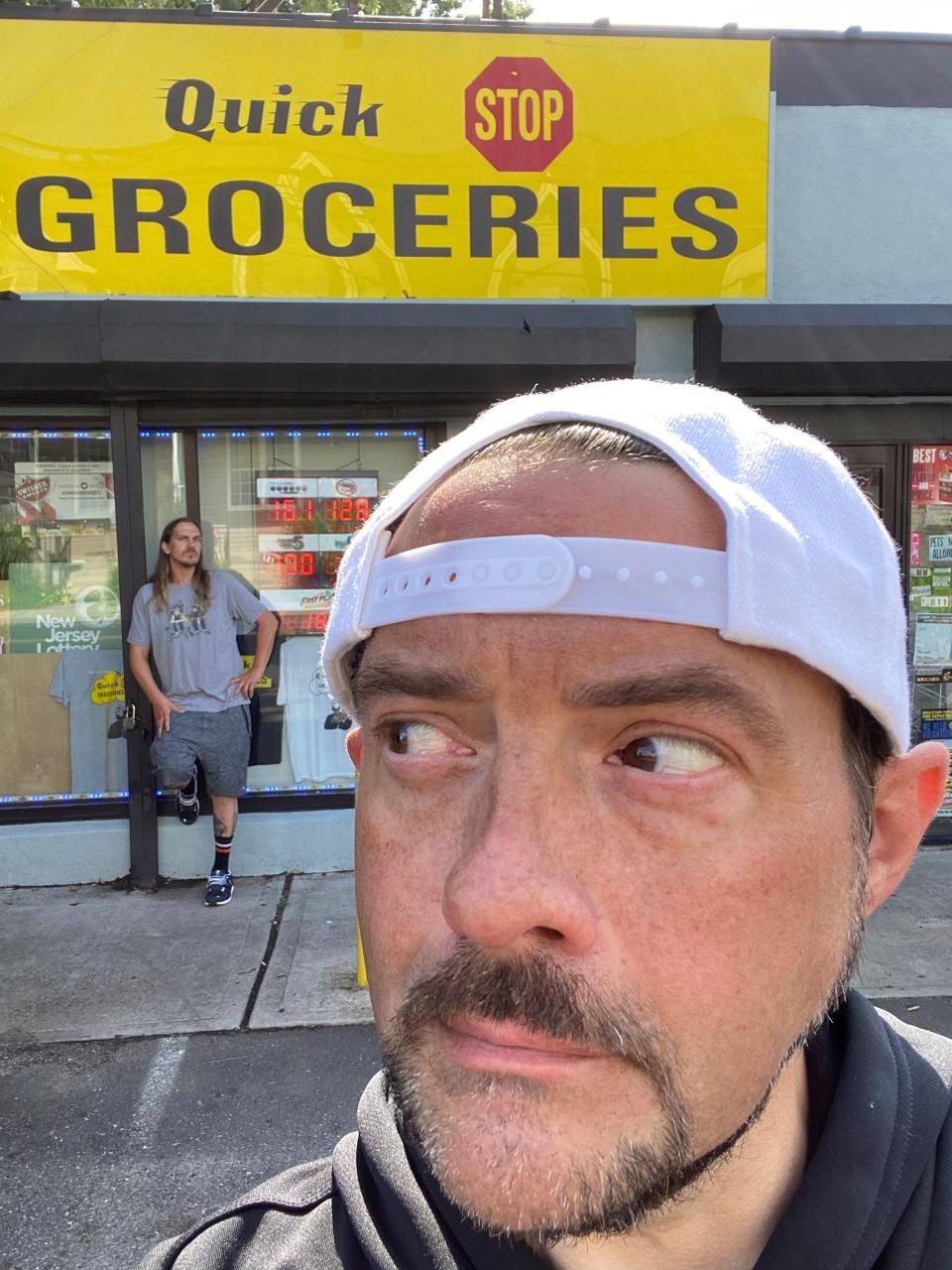 Kevin Smith (and Jason Mewes in the background) pictured in front of the Quick Stop in the Leonardo section of Middletown. "Clerks III" was filmed there last summer.