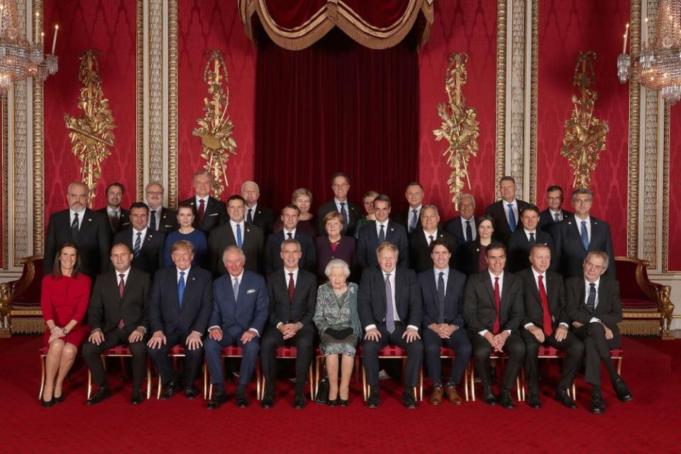 Leaders of NATO alliance countries, and its secretary general, join Queen Elizabeth and Prince Charles for a group picture to mark 70 years of the alliance | YUI MOK/POOL/AFP via Getty
