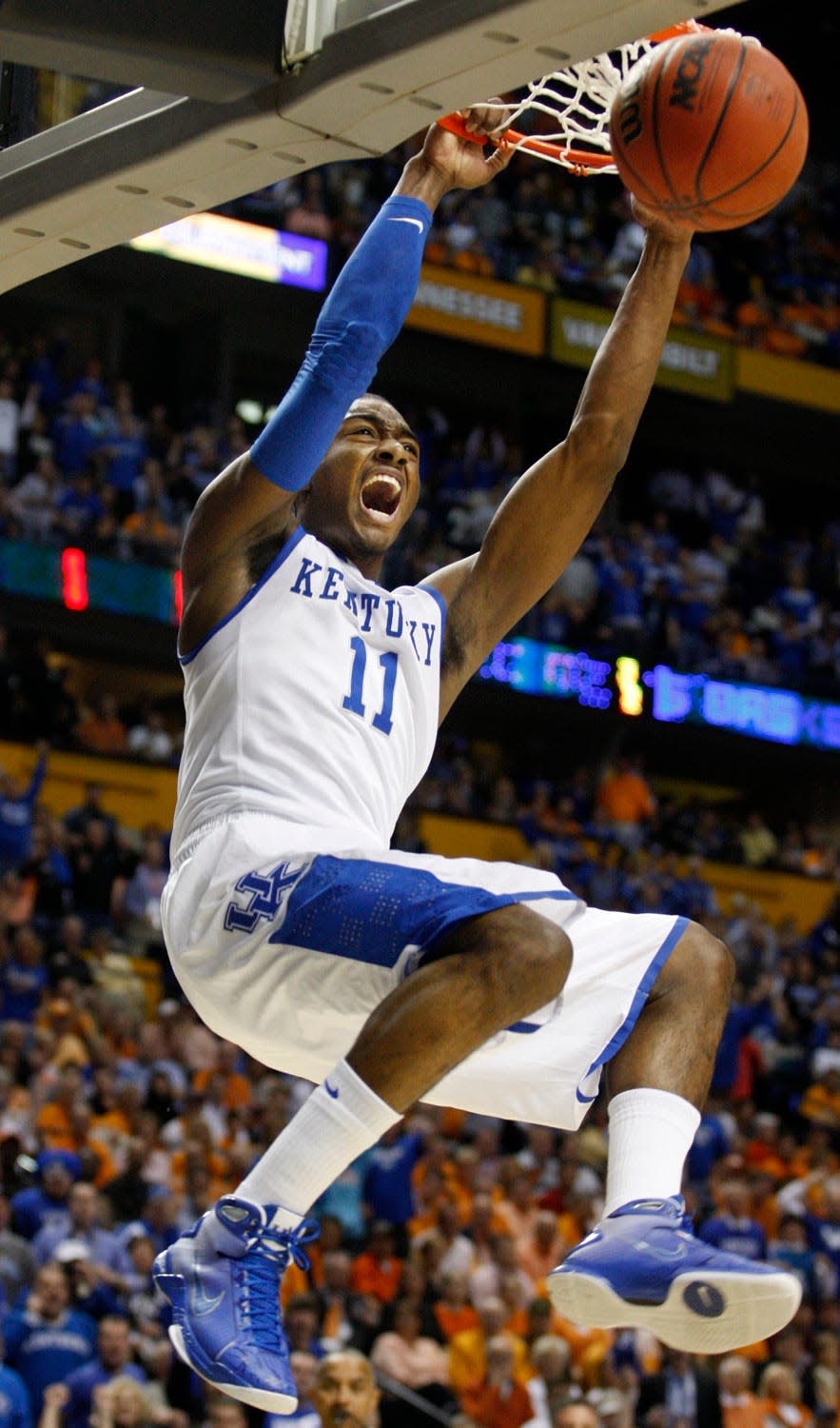 Kentucky's John Wall dunks the ball in the game against Tennessee.   Mar. 13, 2010