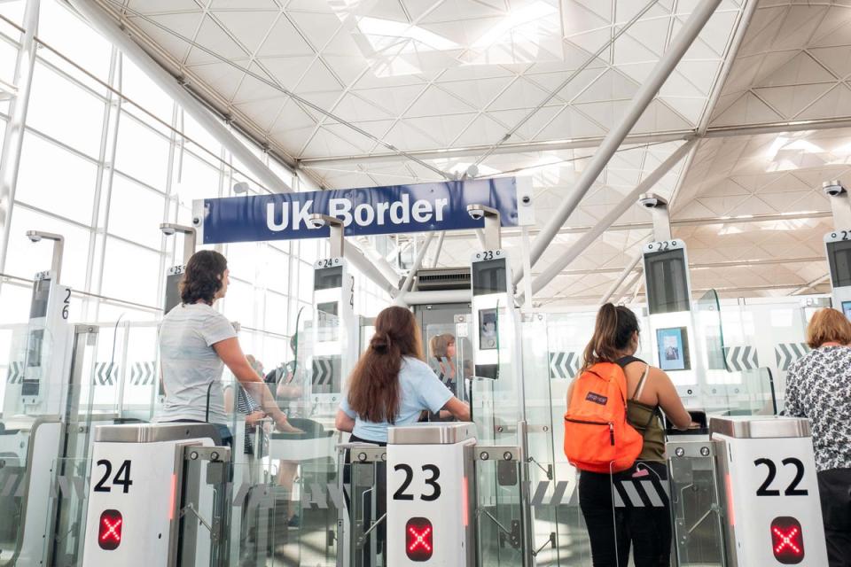 E-gates are electronic gates installed at immigration checkpoints in airports and certain other ports of entry (Alamy/PA)