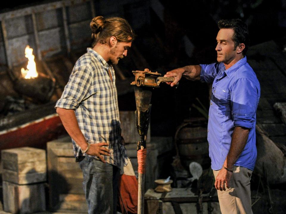 Malcolm Freberg on Survivor getting his torch snuffed out by Jeff Probst, getting sent home