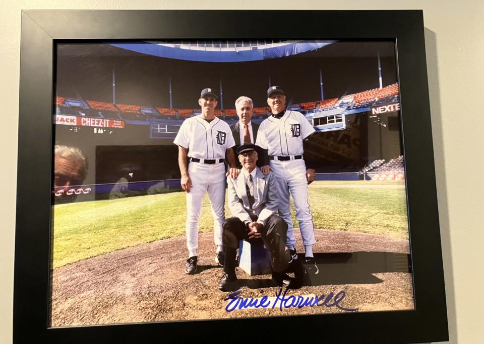 A photo of attorney S. Gary Spicer, and Ernie Harwell and Tiger legends also adorn the walls of his Grosse Pointe office.