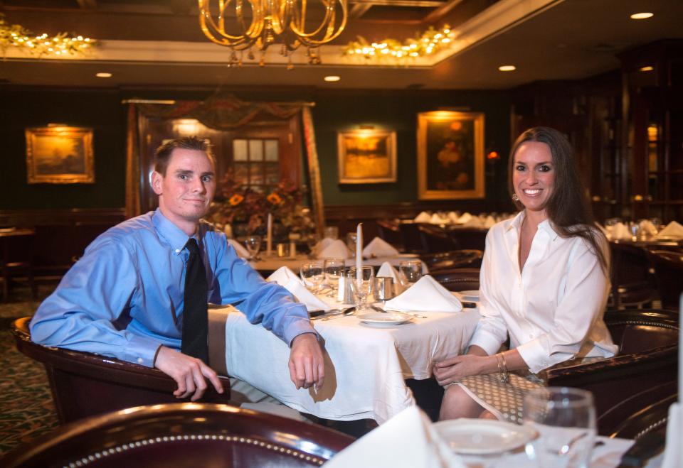 DAVID ZALAZNIK/JOURNAL STAR Siblings Kristin Comfort and Nick Comfort in Jim's Steakhouse in Peoria.