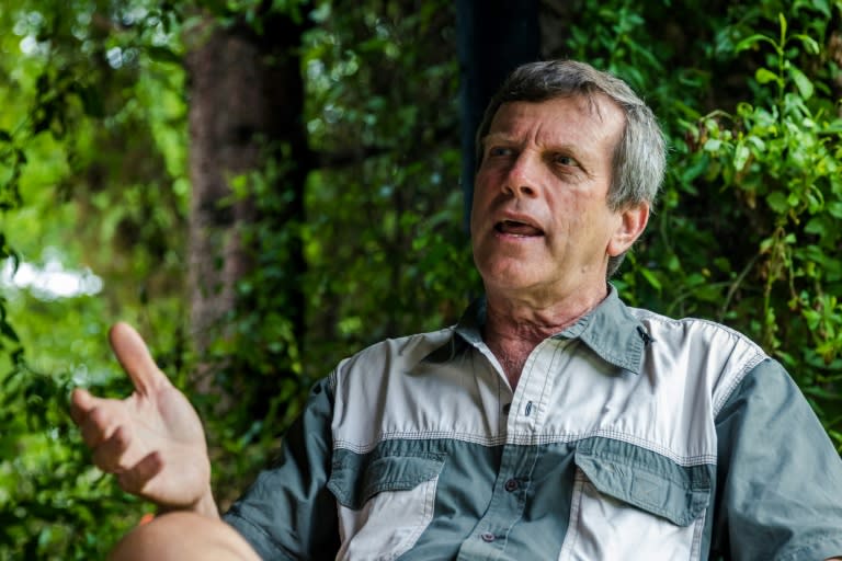 Deon Theron, once president of Zimbabwe's Commercial Farmers Union, stands outside the farm he lost in 2008. He knows he will never get his land back, but hopes the post-Mugabe government will turn to white farmers for help with ailing agriculture