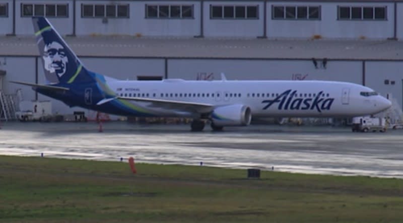 <em>The Boeing 737 Max 9 that lost a door on Alaska Airlines Flight 1282 sits on the tarmac at Portland International Airport, January 6, 2024 (KOIN)</em>