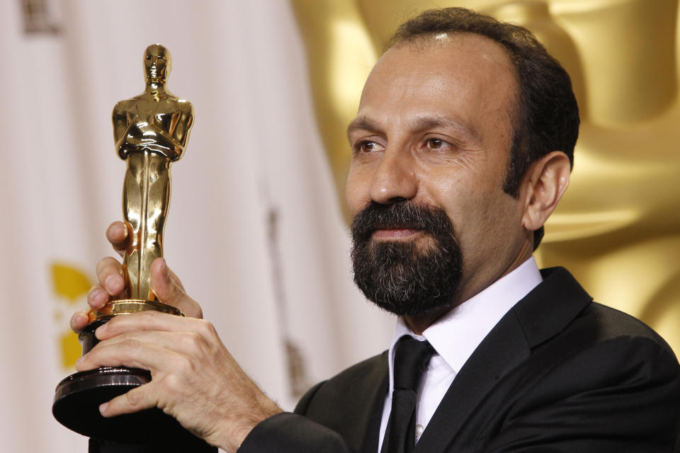 Asghar Farhadi, from Iran, poses with his award for best foreign language film for "A Separation" during the 84th Academy Awards on Sunday, Feb. 26, 2012, in the Hollywood section of Los Angeles. (AP Photo/Joel Ryan)