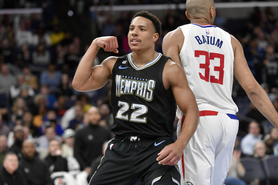 Memphis Grizzlies guard Desmond Bane (22) reacts after scoring in the first half of an NBA basketball game against the Los Angeles Clippers, Friday, March 31, 2023, in Memphis, Tenn. (AP Photo/Brandon Dill)