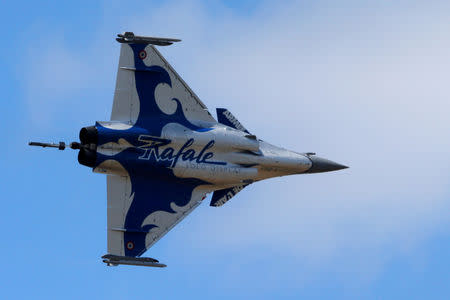 FILE PHOTO: A Dassault Rafale fighter takes part in flying display during the 52nd Paris Air Show at Le Bourget Airport near Paris, France June 25, 2017. REUTERS/Pascal Rossignol/File Photo